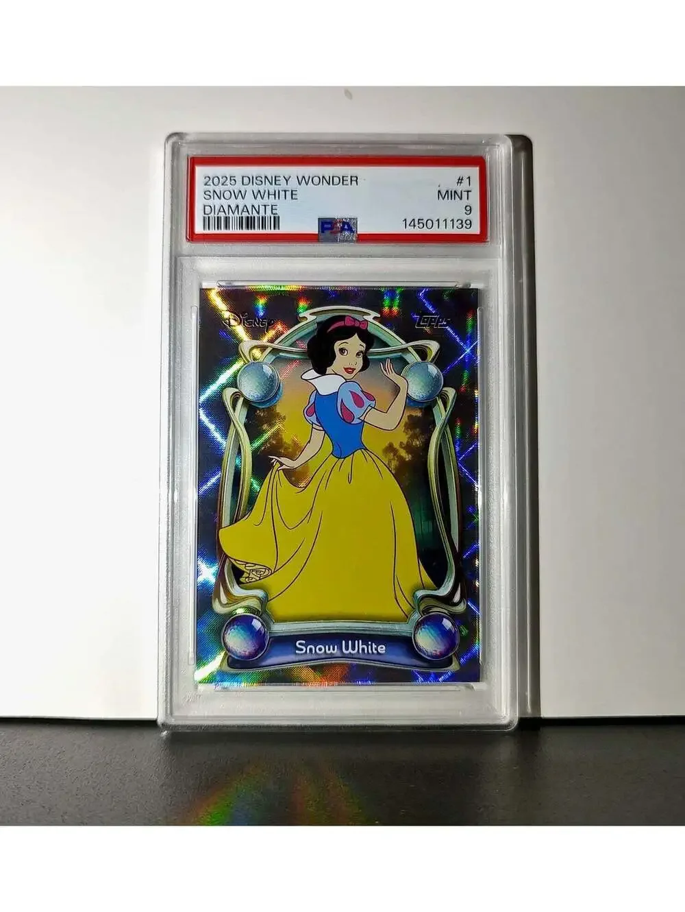 Snow White 2025 Topps Disney #1 Winter Snow White and the Seven Dwarfs PSA 9